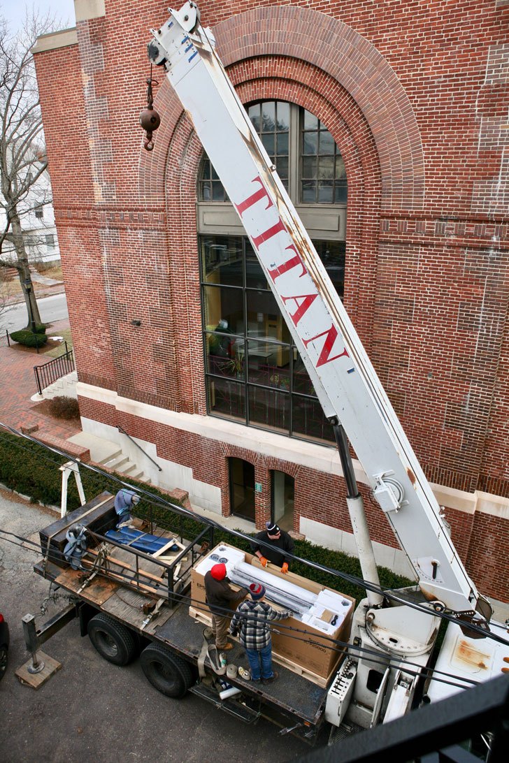 Epson P20000 printer sitting on truck ready to be hoisted by a crane for delivery into the studio